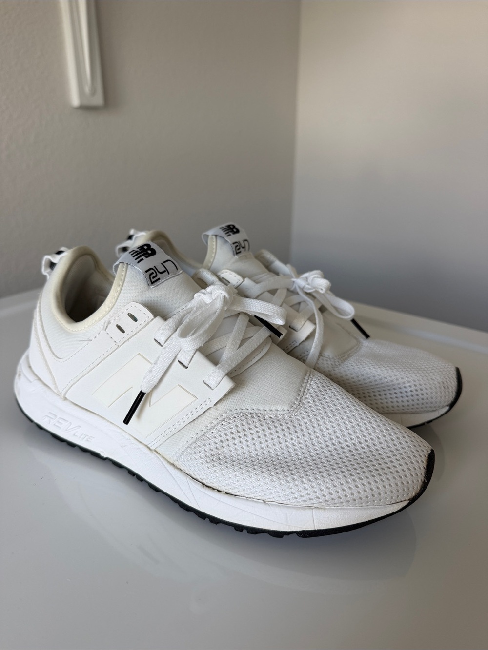 New Balance White Mesh Sneakers with Black Outsole Accents